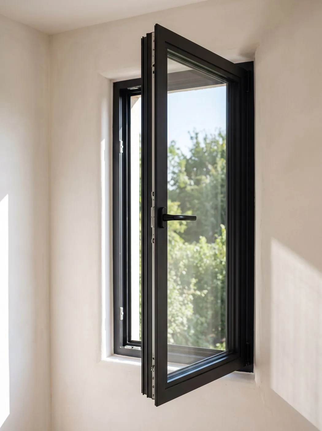 Aluminium casement window with slim black frame, partly open