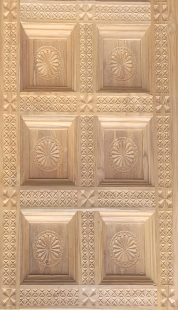 Teak door with diamond and rosette carved panels