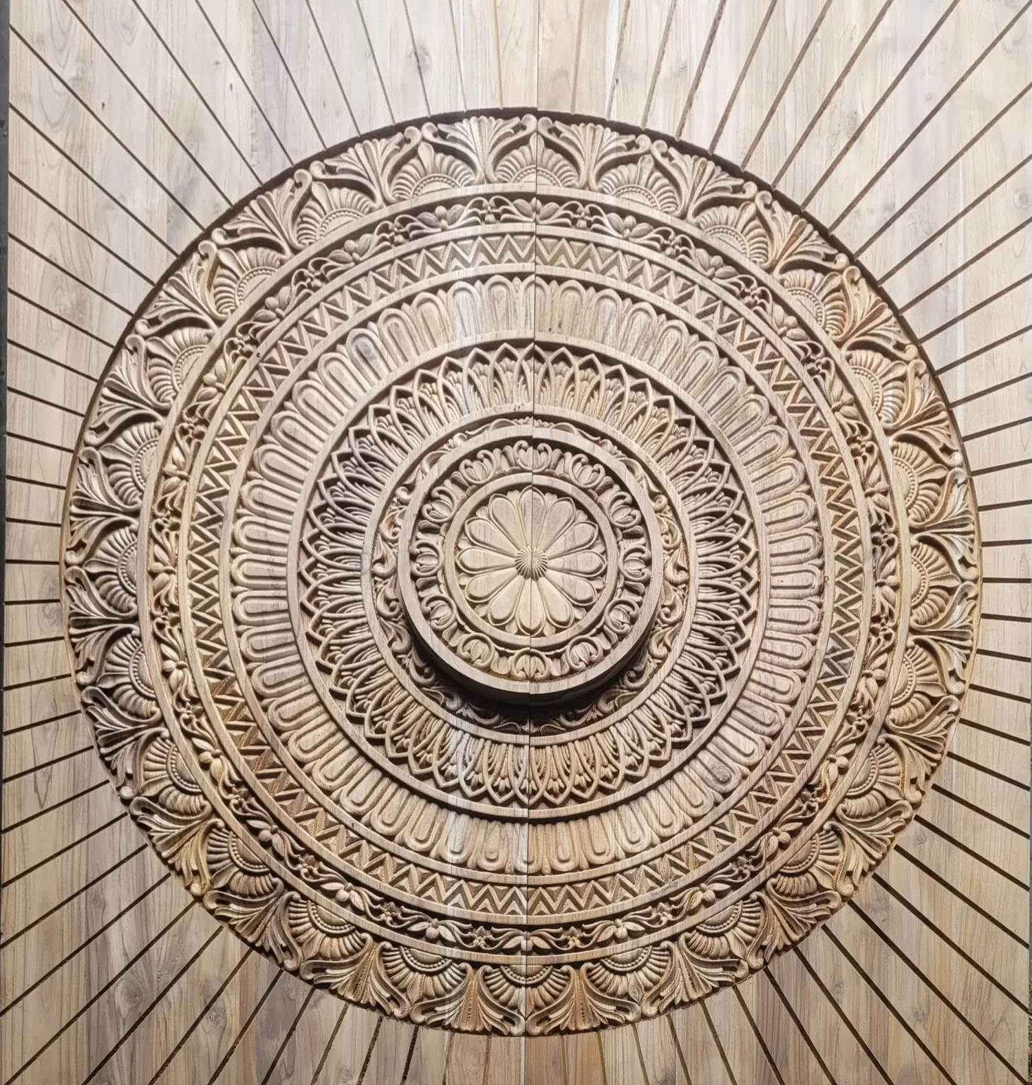 CNC-carved teak mandala sunburst door