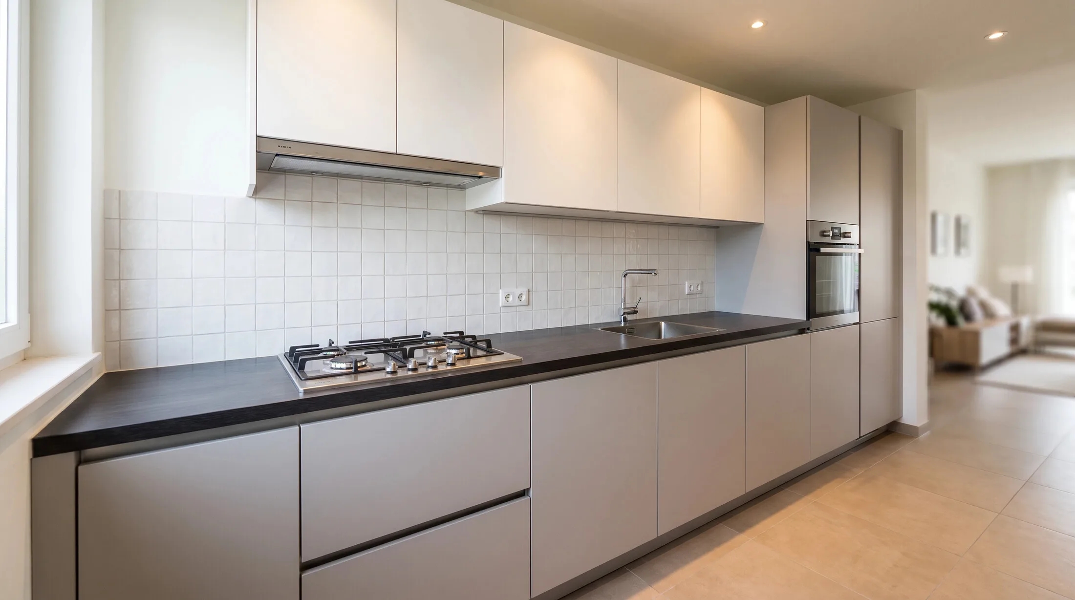 Simple handleless laminate galley kitchen