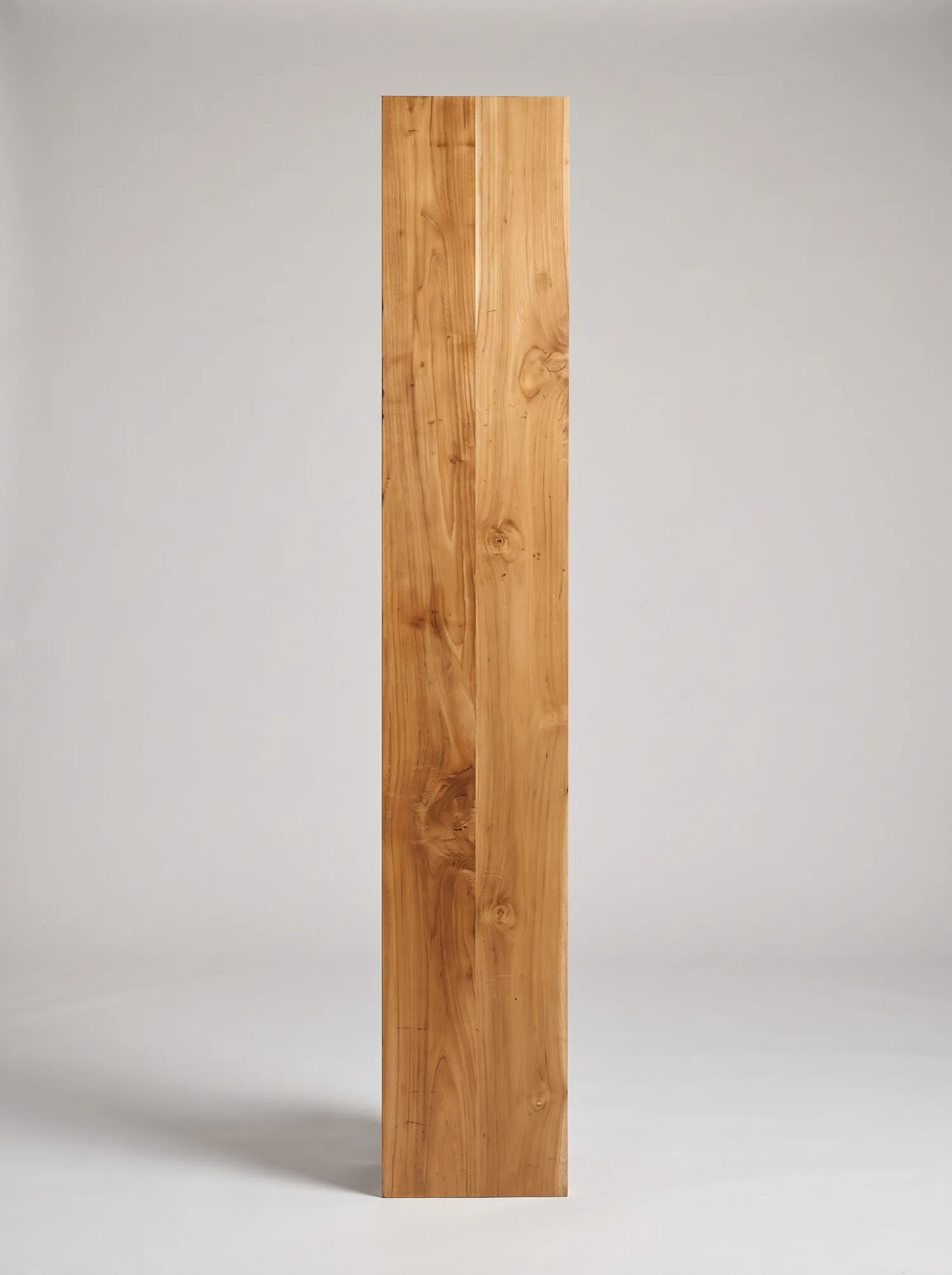 Jointed teak board showing the joint line down its length
